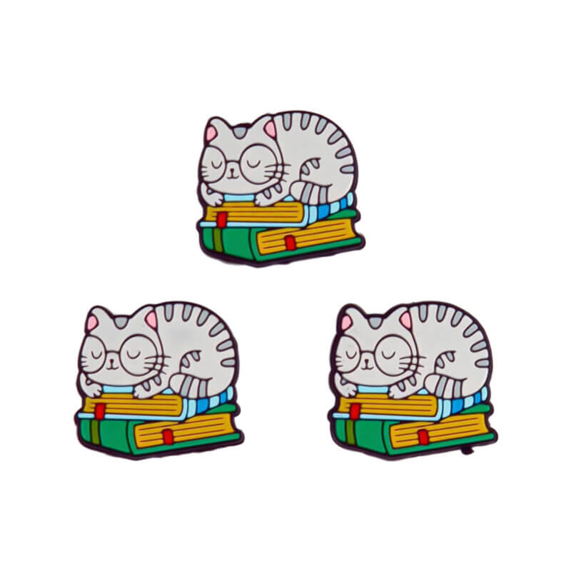 Silikonperlen - Katze auf Büchern