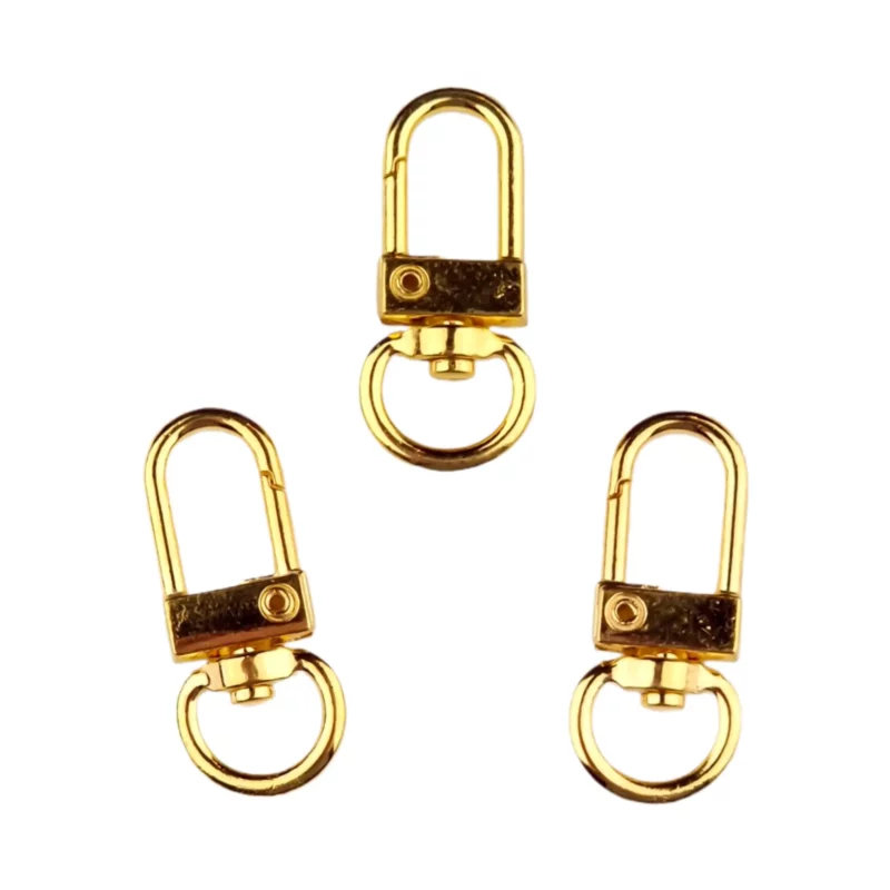 Schlüsselanhänger - Clip On Musketeon - Gold