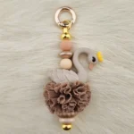DIY Sleutel / Telefoonhanger - Zwaantje - Taupe met Ruche